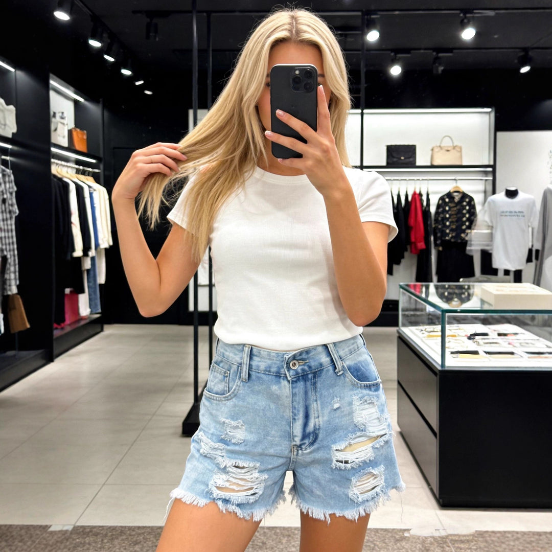 Women's Destroyed Denim Shorts with High Pockets and Frayed Hem Lisslune