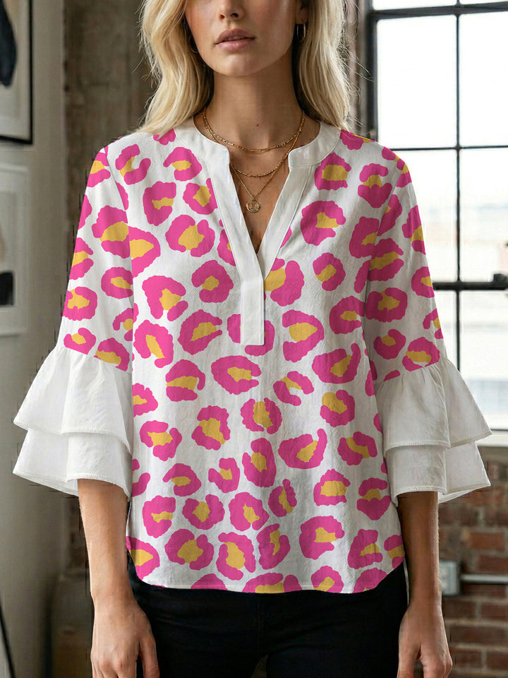Women's blouse with ruffle details and eye-catching animal print Lisslune