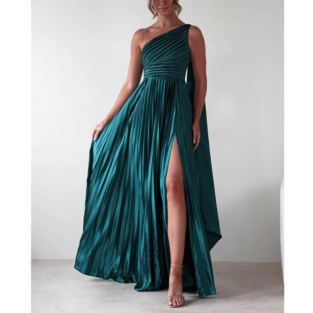 Ladies evening dress with elegant pleated skirt and asymmetric top