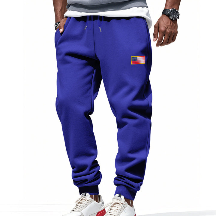 Men's sporty sweatpants with elastic waistband and practical side pockets Lisslune
