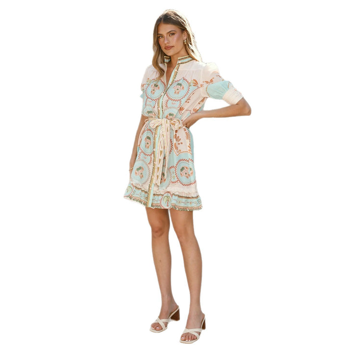 Women’s short sleeve dress with decorative button placket and playful ruffle