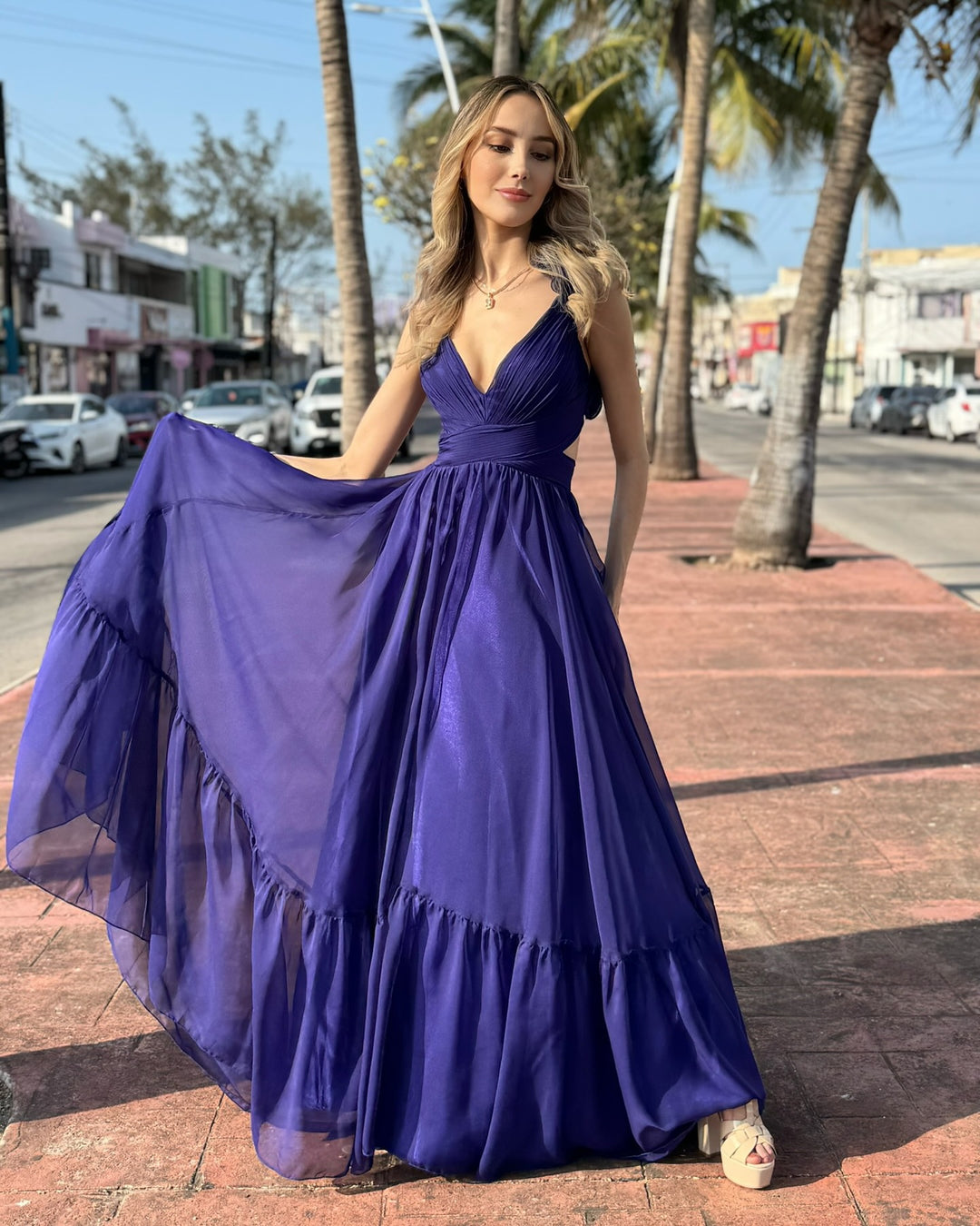 Women's maxi dress with airy ruffle details and extravagant wrap design