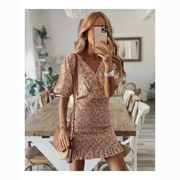 Ladies mini dress with floral ruffles and elastic waistband Lune London