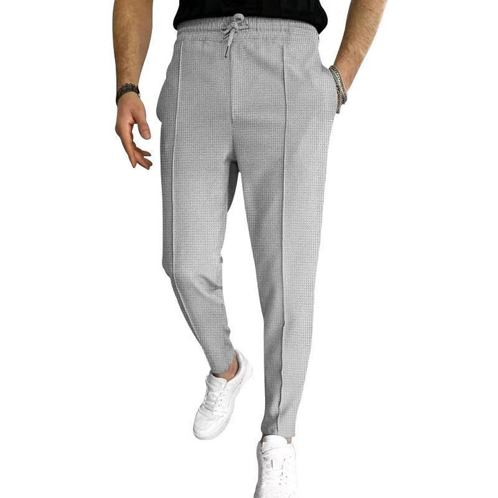 Men's loose casual pants with elastic waistband and stylish textured design Lisslune
