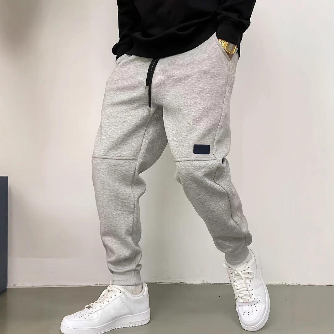 Men's sporty jogging pants with side zipper details Lisslune
