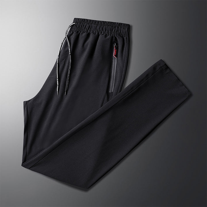 Men's sporty jogging pants with elastic waistband and side zipper Lisslune