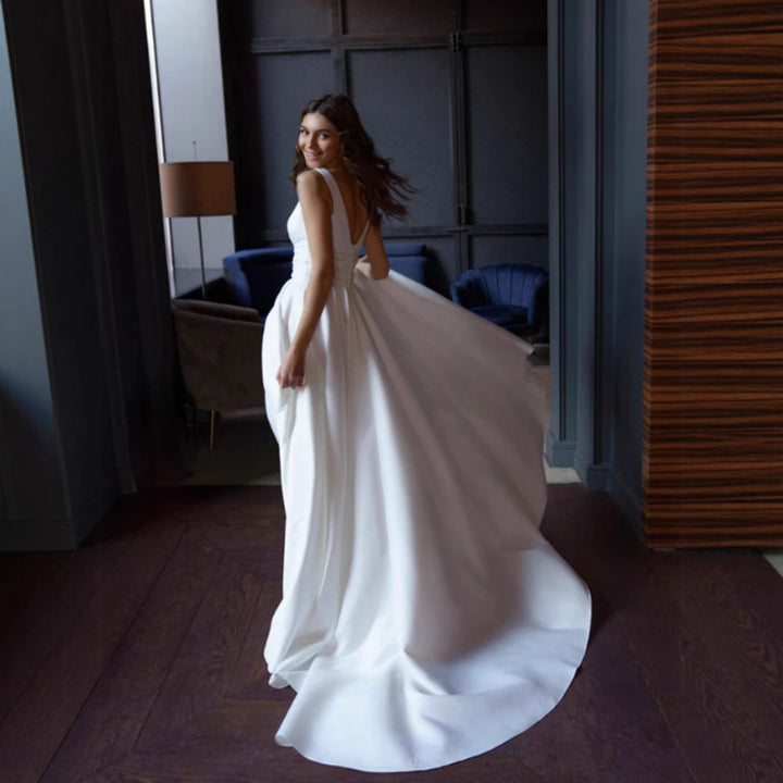 Women's elegant wedding dress with deep V-neckline and side slit