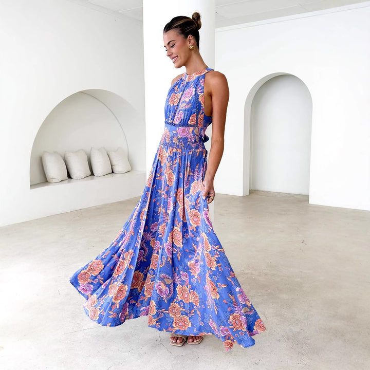 Women’s maxi dress with elegant floral design and flowing skirt