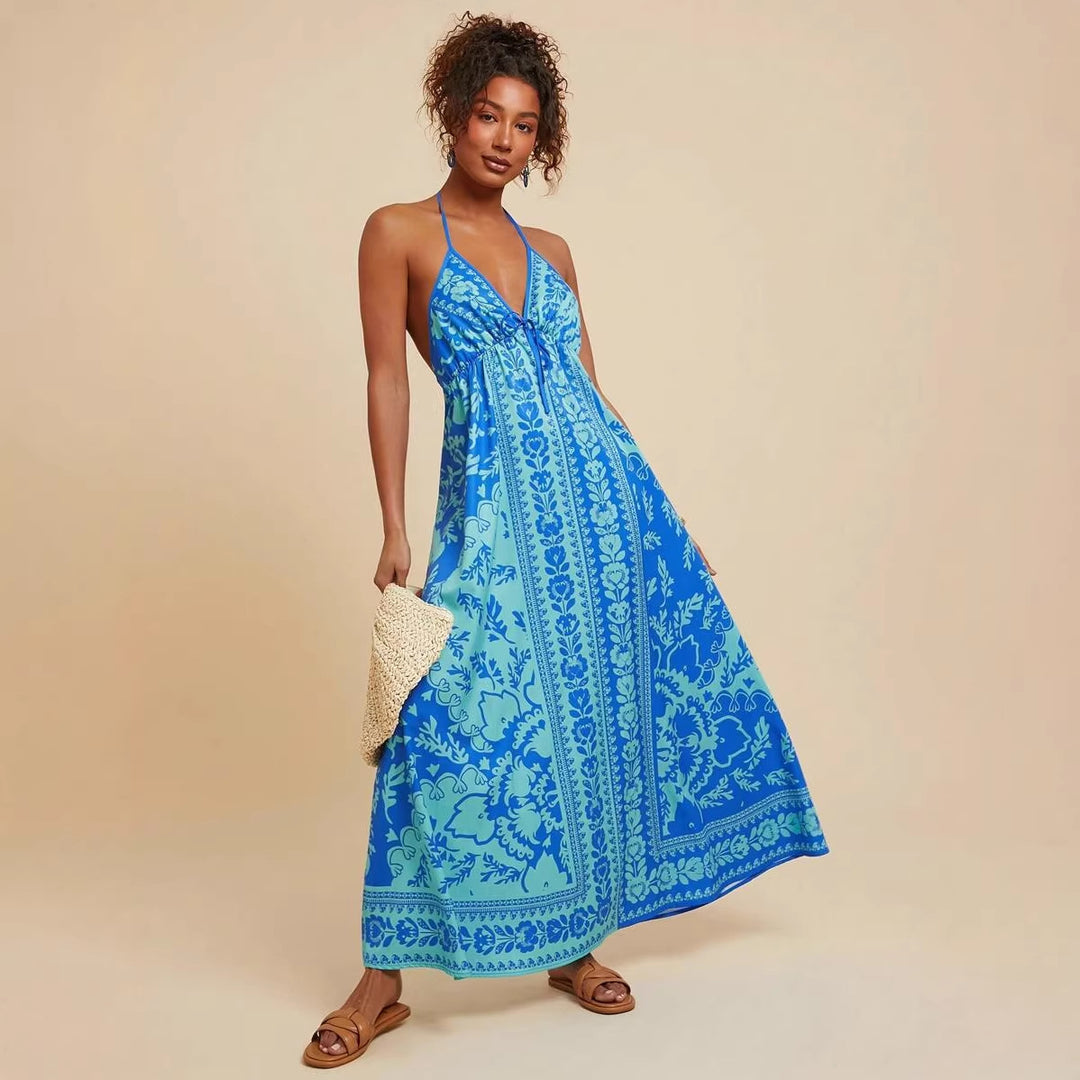 Women's maxi dress with deep V-neckline and floral pattern details Lune London