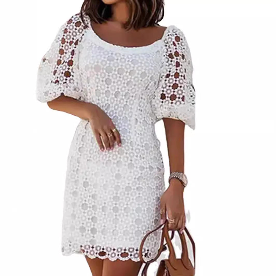 Ladies lace dress with airy puff sleeves and elegant crochet details