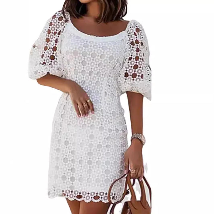 Ladies lace dress with airy puff sleeves and elegant crochet details