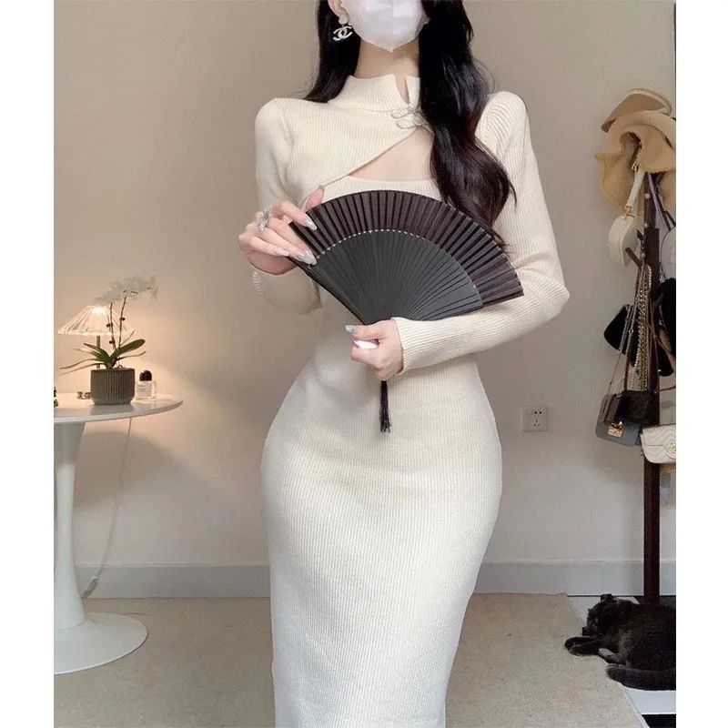 Women's elegant midi dress with asymmetrical cut-out design and textured knit