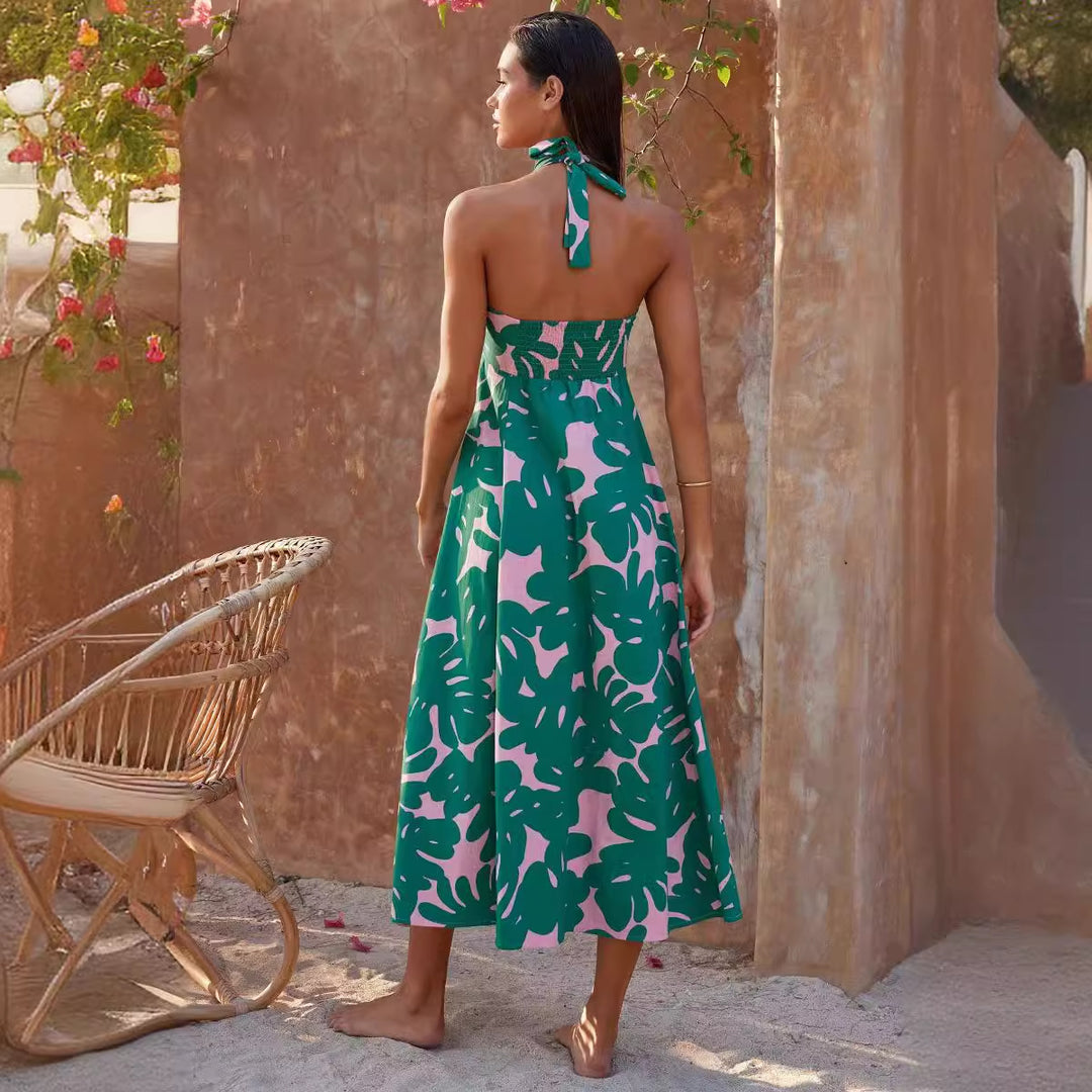 Women's maxi dress with floral bandeau design and elegant flared skirt