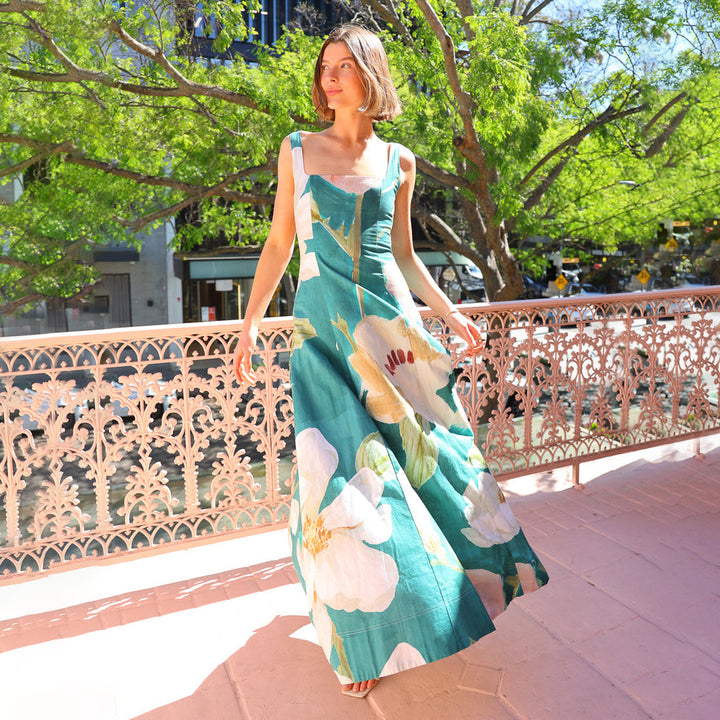 Women's maxi dress with floral design and fitted silhouette