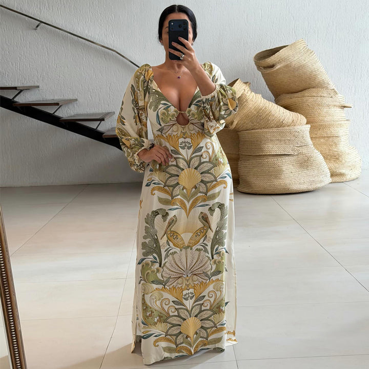 Ladies maxi dress with intricate floral design and deep V-neck
