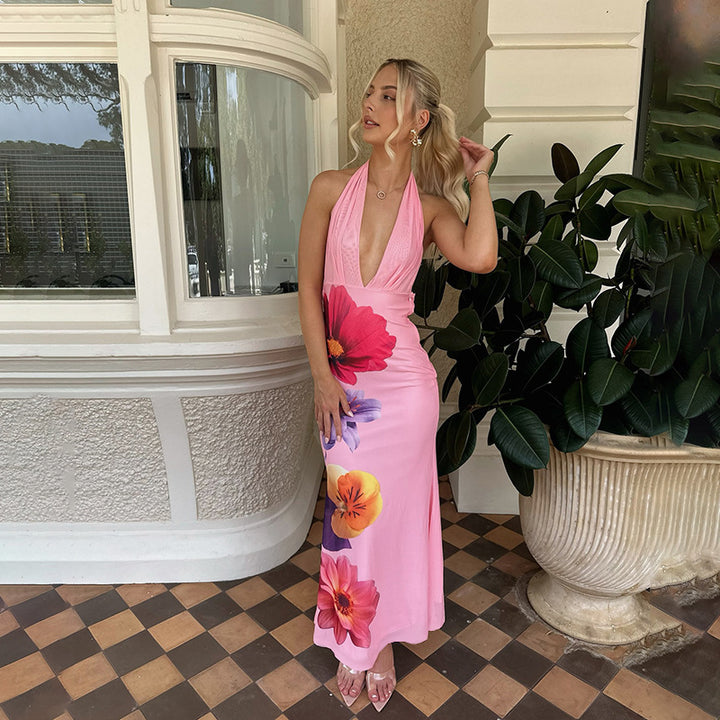 Ladies max dress with deep V-neckline and floral accents Lune London