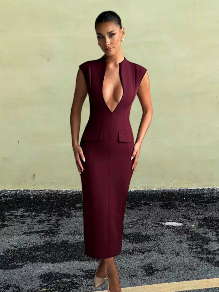 Women's elegant form-fitting dress with deep V-neck and practical pockets