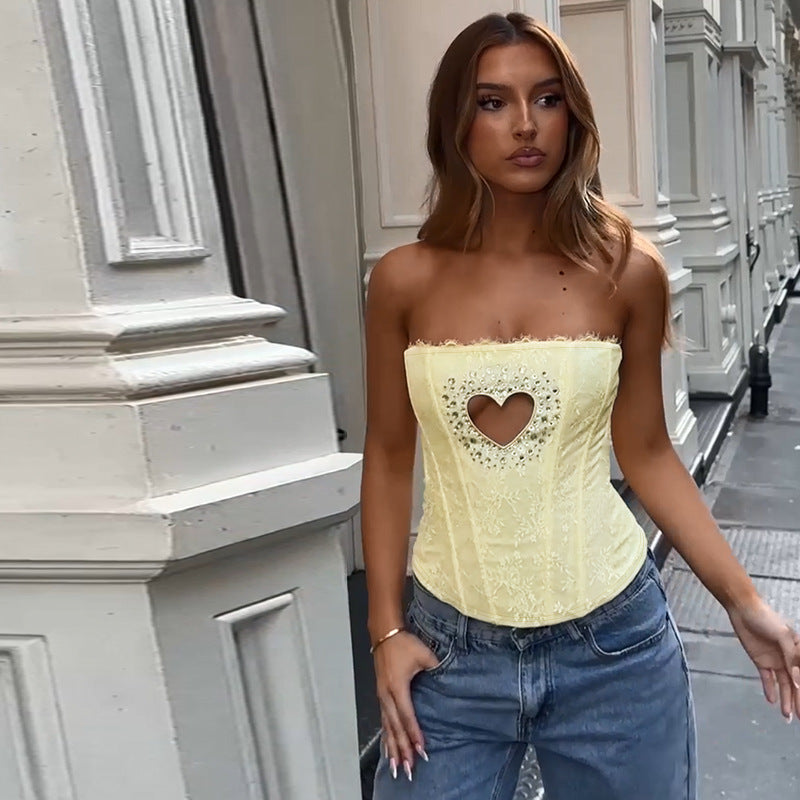 Women's bustier top with heart-shaped neckline and elegant rhinestone details