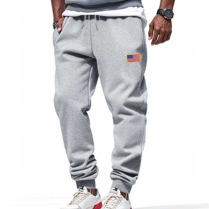 Men's sporty sweatpants with elastic waistband and practical side pockets Lisslune