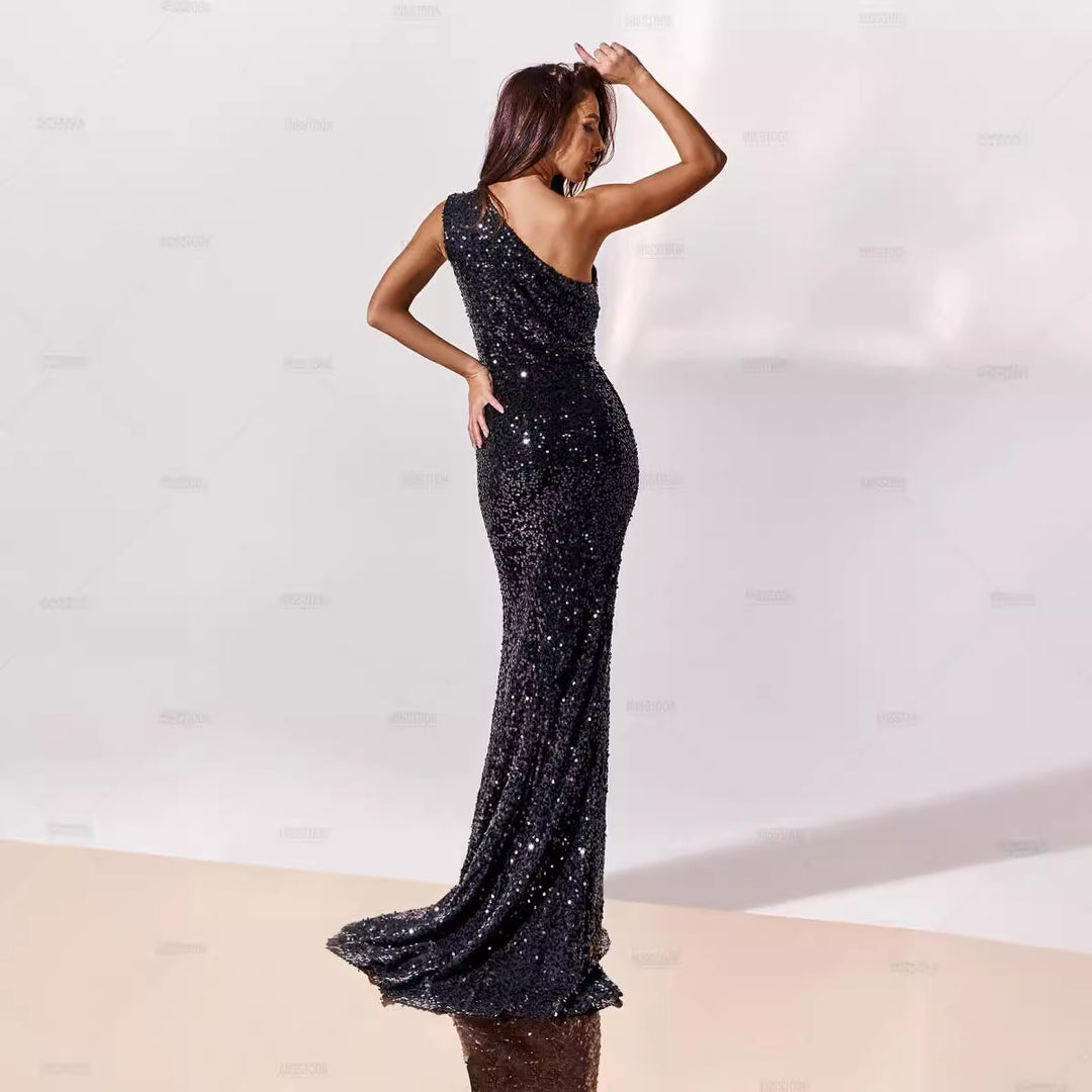 Ladies' functional evening dress with asymmetric cut and sequin embellishment
