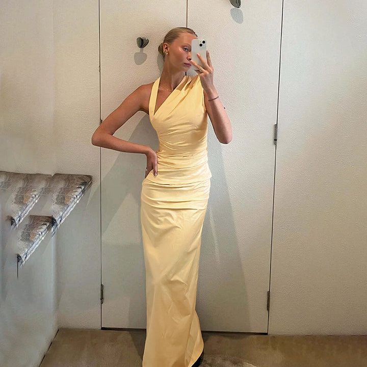 Ladies elegant wrap evening dress with asymmetrical halter design and form-fitting cut
