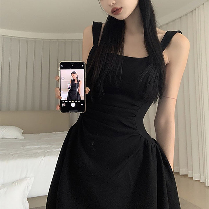 Women's elegant midi dress with tailored silhouette and sophisticated pleats