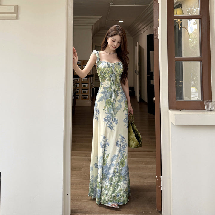 Women's dress with floral ruffle design and figure-hugging cut