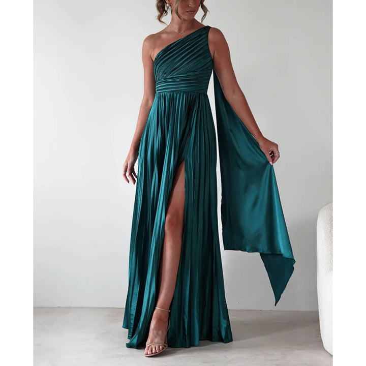 Ladies evening dress with elegant pleated skirt and asymmetric top