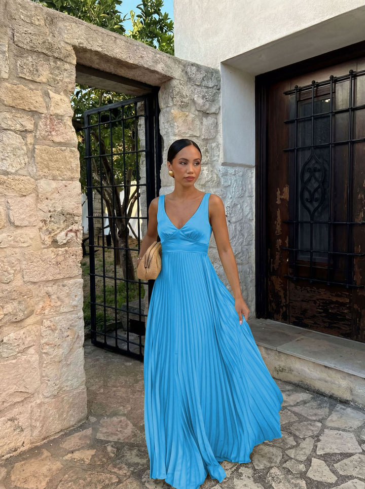 Women's pleated dress with deep V-neckline and elegant silhouette