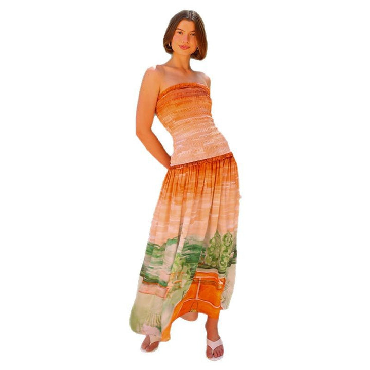 Women's maxi wrap dress with elastic top and flowing skirt