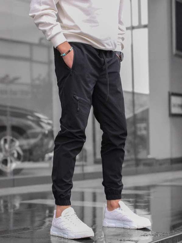 Men's sporty jogging pants with practical zip pockets and elastic waistband Lisslune