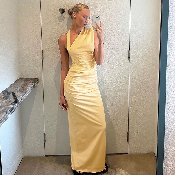 Ladies elegant wrap evening dress with asymmetrical halter design and form-fitting cut