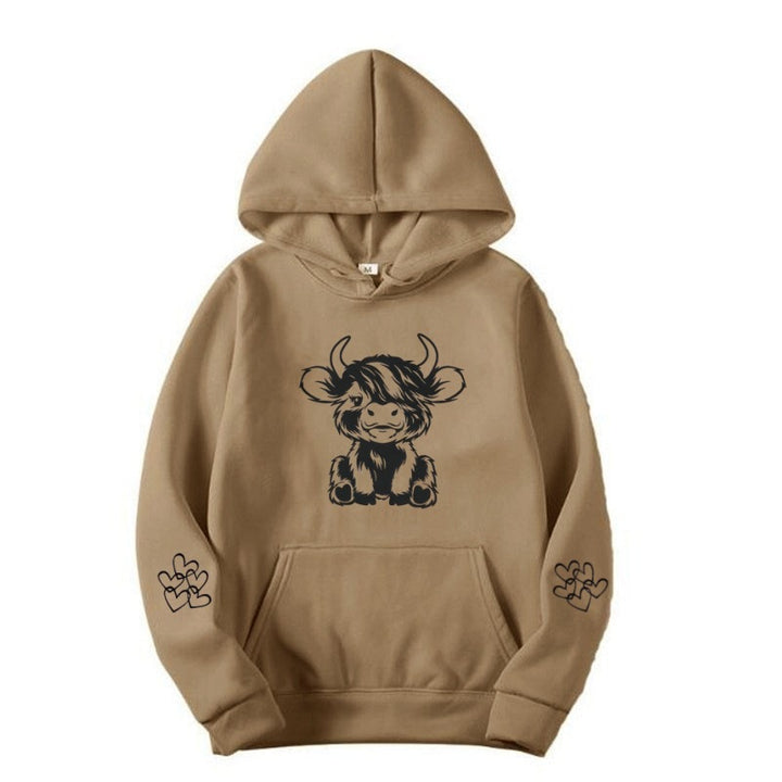 Women's hooded sweatshirt with charming cow motif and practical kangaroo pockets Lisslune