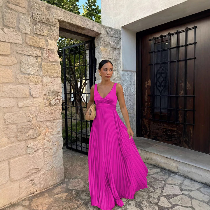 Women's pleated dress with deep V-neckline and elegant silhouette