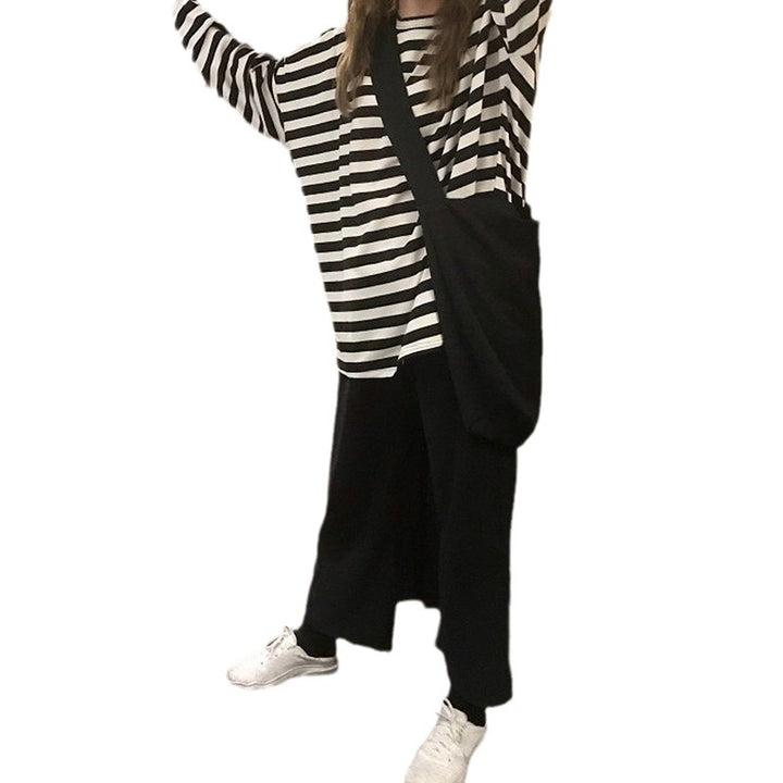 Women's striped long-sleeve shirt with a loose fit and modern details