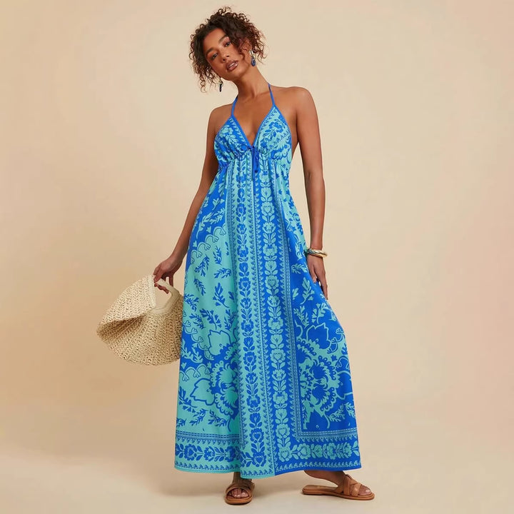 Women's maxi dress with deep V-neckline and floral pattern details Lune London