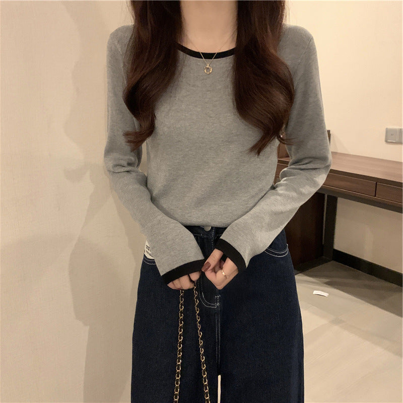 Women's long sleeve top with elegant contrasting collar and figure-flattering cut
