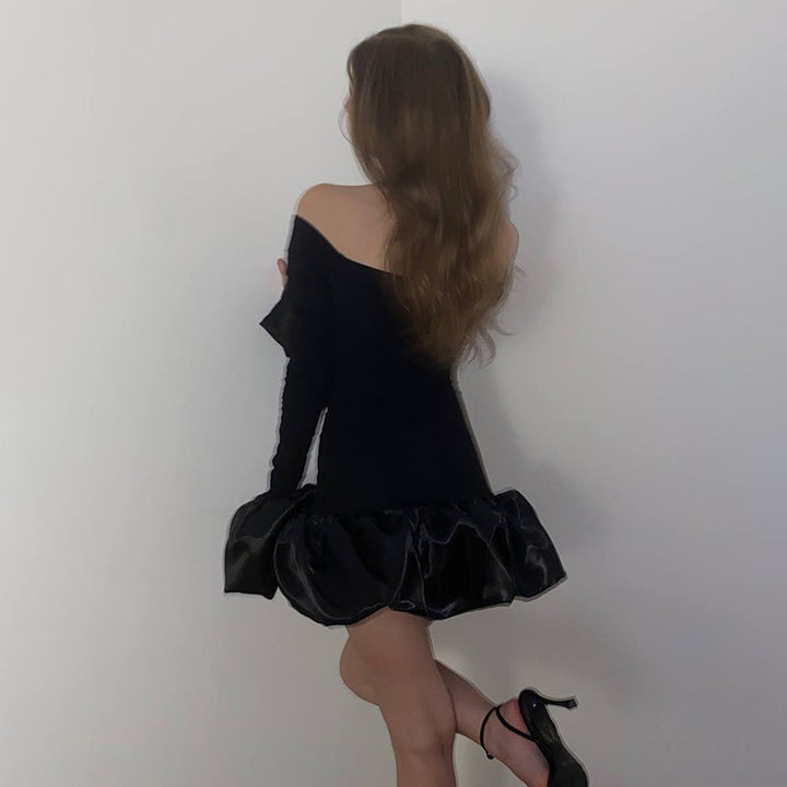 Women's off-shoulder mini dress with asymmetric ruffle details and transparent sleeves