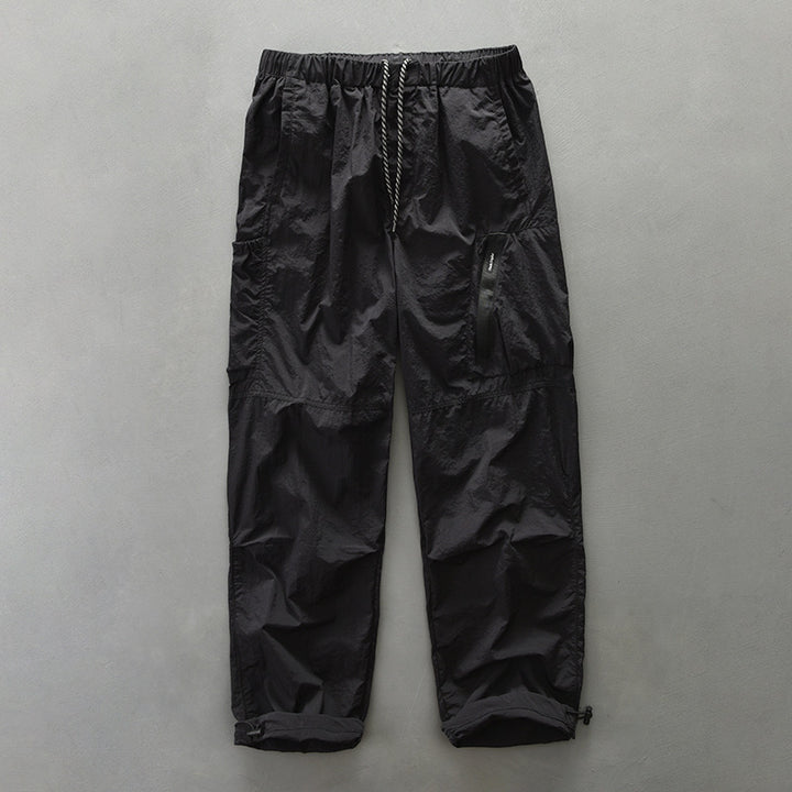 Men's functional trousers with elastic waistband and side zip pockets Lisslune