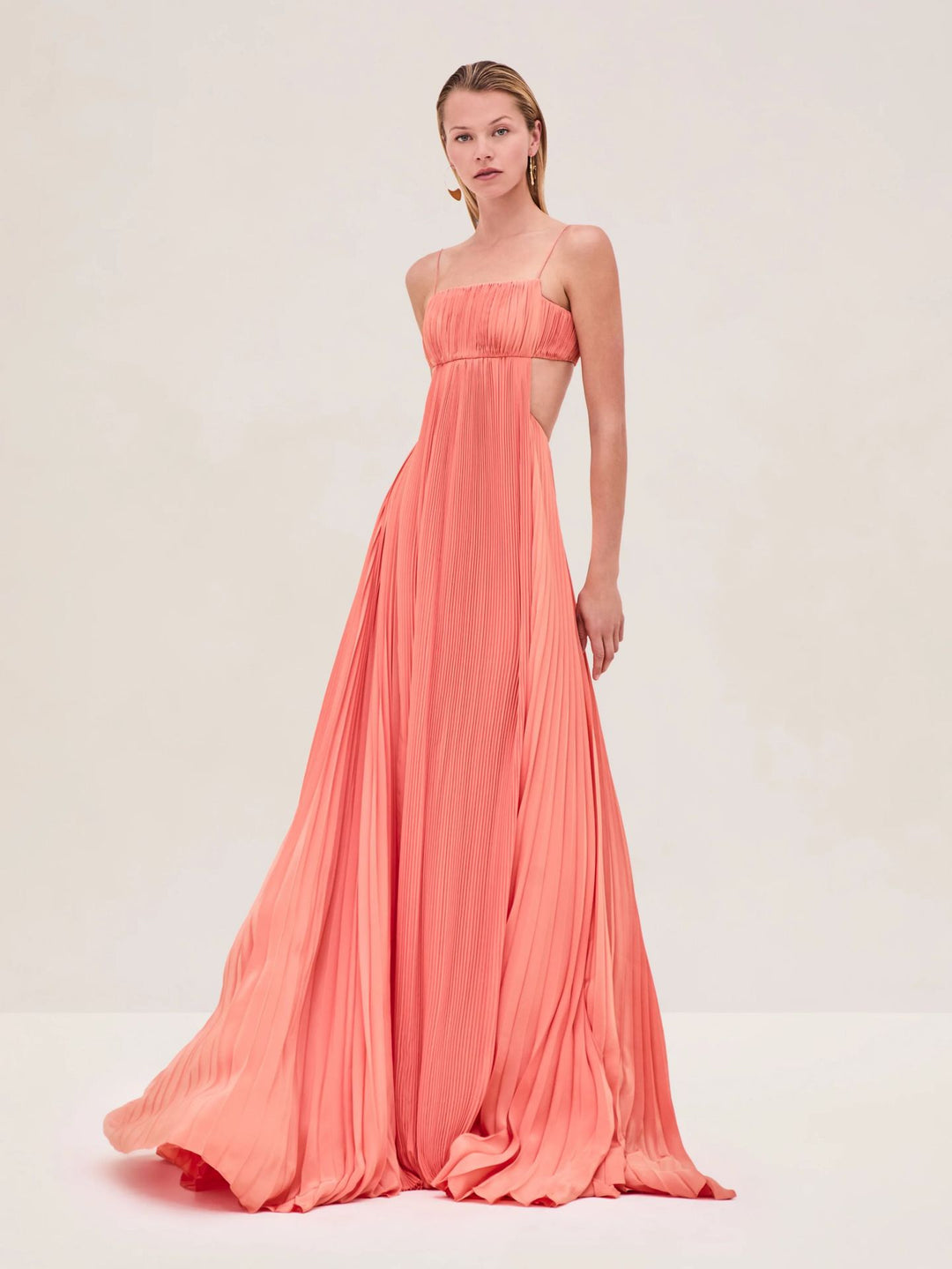 Women's maxi dress with elegant pleated details and thin spaghetti straps