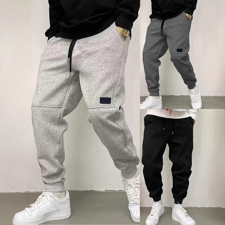Men's sporty jogging pants with side zipper details Lisslune
