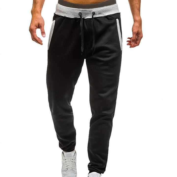 Men's sporty jogging pants with incorporated side pockets and adjustable drawstring Lisslune