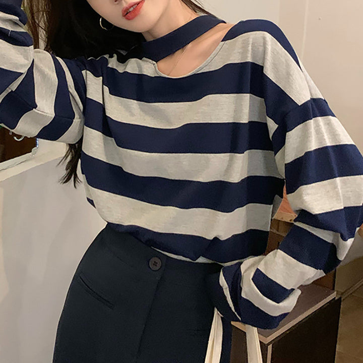 Women’s long sleeve shirt with modern stripes and an elegant neckline