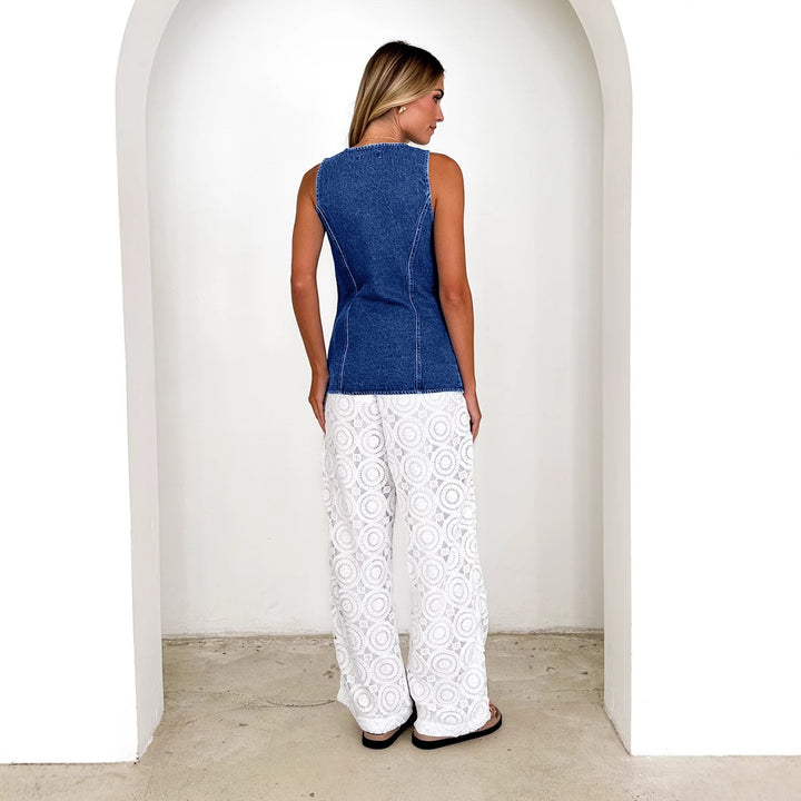 Women's jeans vest in a modern cut and practical pockets