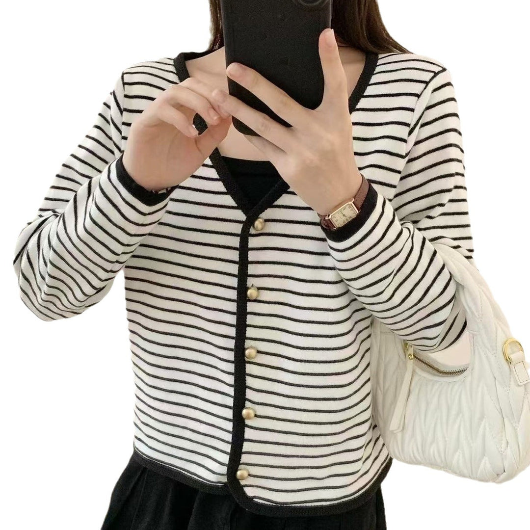 Ladies striped cardigan with elegant buttons and modern V-neck