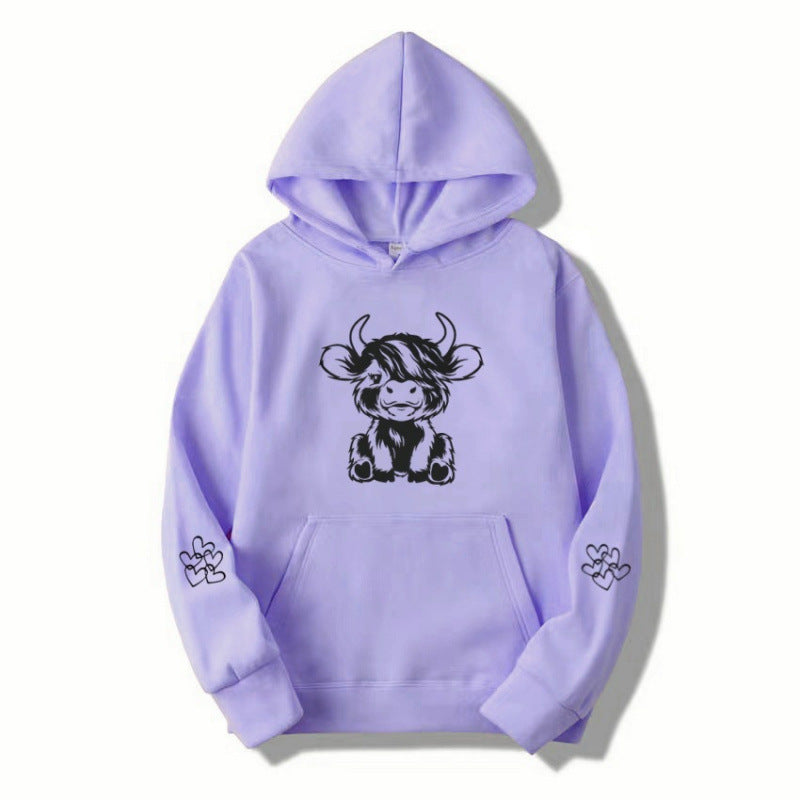 Women's hooded sweatshirt with charming cow motif and practical kangaroo pockets Lisslune