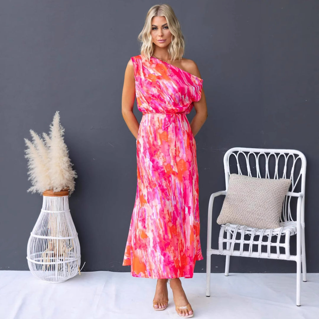 Women's maxi dress with asymmetrical design and flowing fabric
