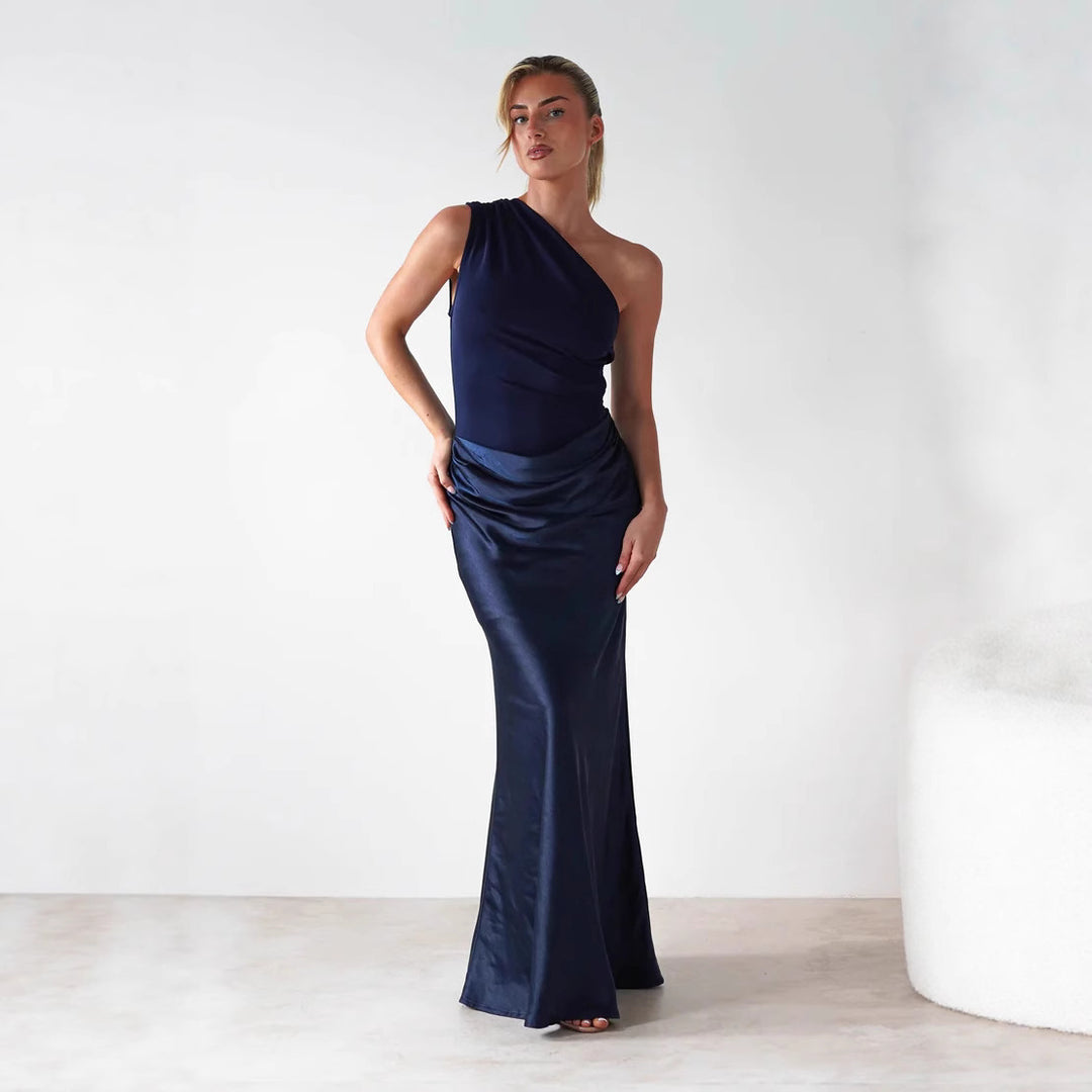 Women’s evening dress with asymmetrical cut and elegant draping design