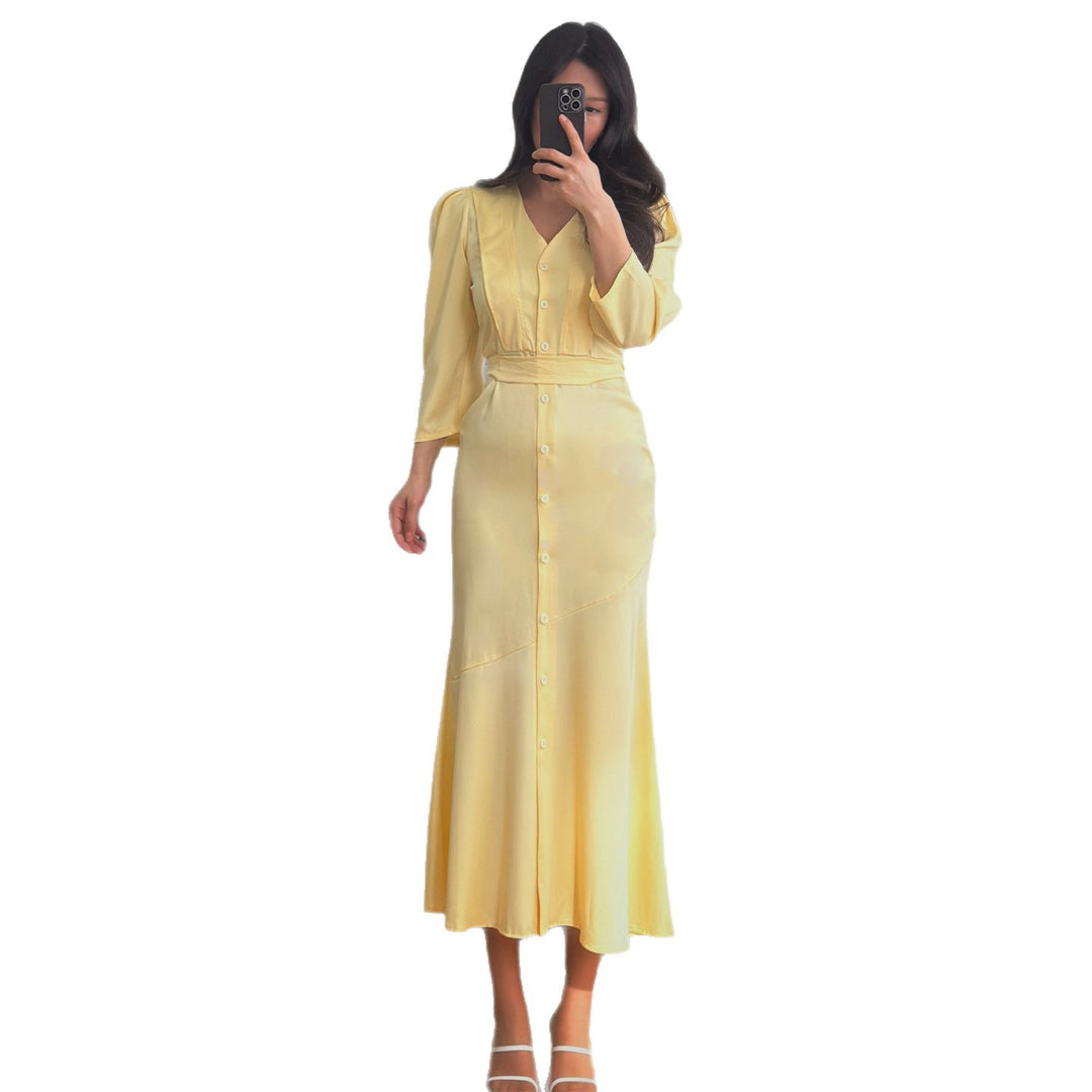 Women's maxi dress with button placket and elegant puff sleeves