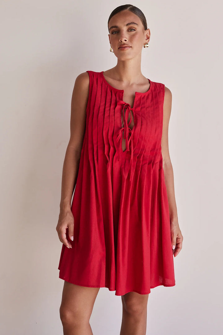 Ladies A-line dress with playful knot and refined pleats Lune London